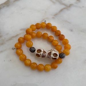 Orange beaded skull bracelets